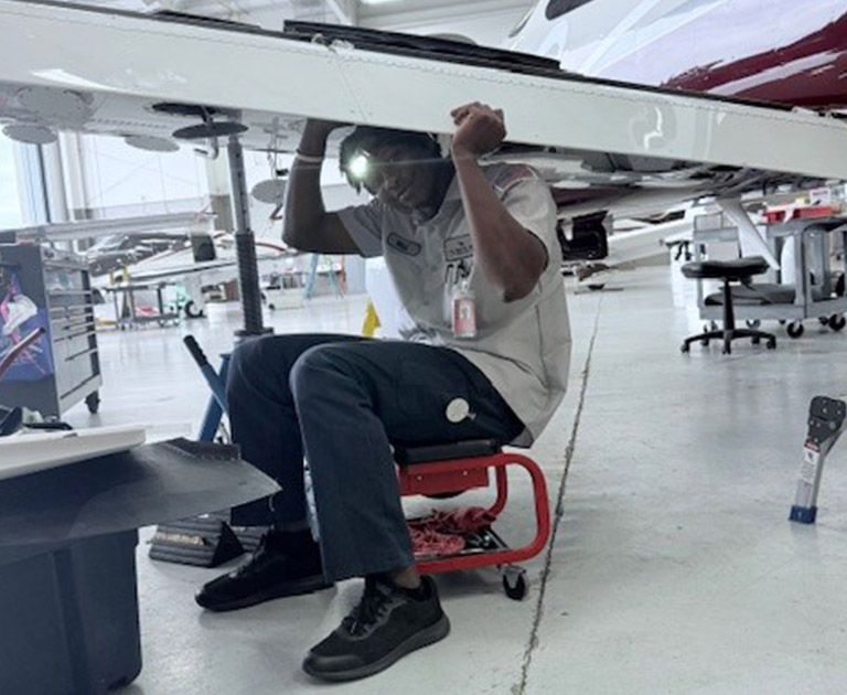 Wilderson Ulysse working at flightline